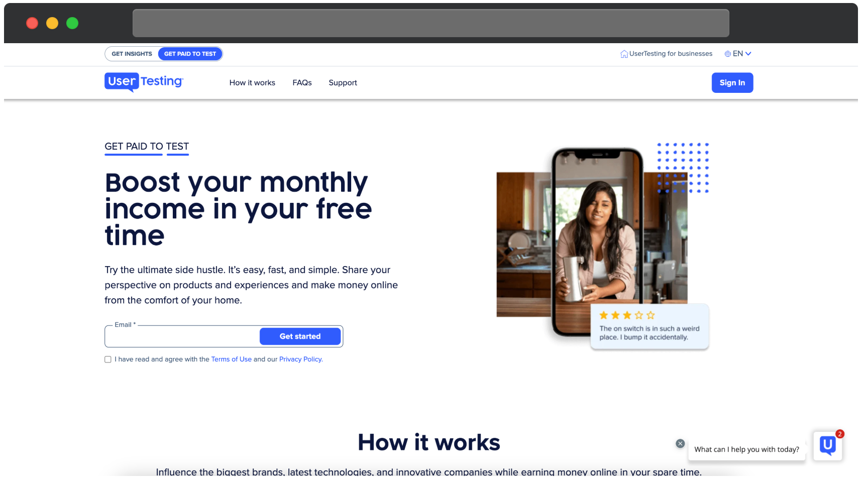 The UserTesting sign up for participants, promoting the opportunity to get paid for testing. The page features a bold heading that reads, Boost your monthly income in your free time, followed by a description encouraging users to share their perspectives on products and experiences. Below, an email input field and a Get started button invite users to sign up. To the right, an image of a woman speaking into a phone appears within a smartphone frame, with a review overlay showing a 3-star rating and feedback about a product switch. Navigation links at the top include How it works, FAQs, Support, and a Sign In button. A chatbot icon with a notification badge is visible in the bottom right corner.
