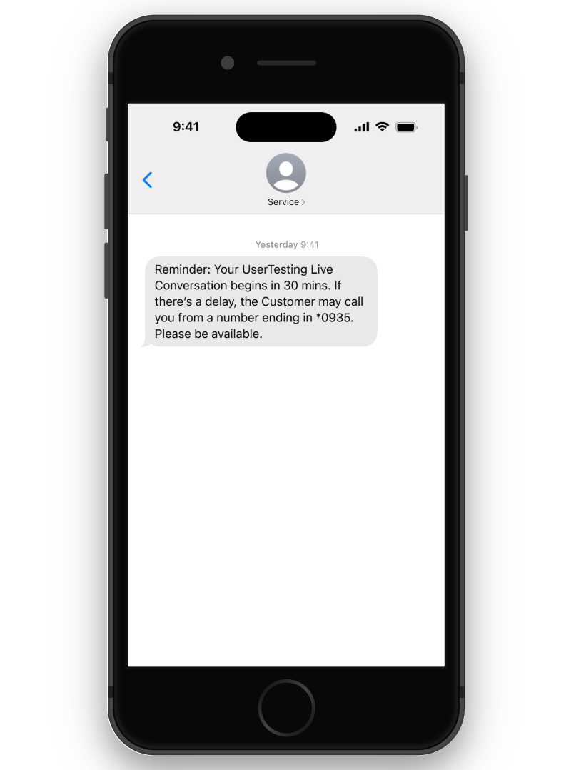 Mobilskärm som visar ett påminnelse-sms för en UserTesting Livekonversation. Meddelandet säger att sessionen börjar om 30 minuter.